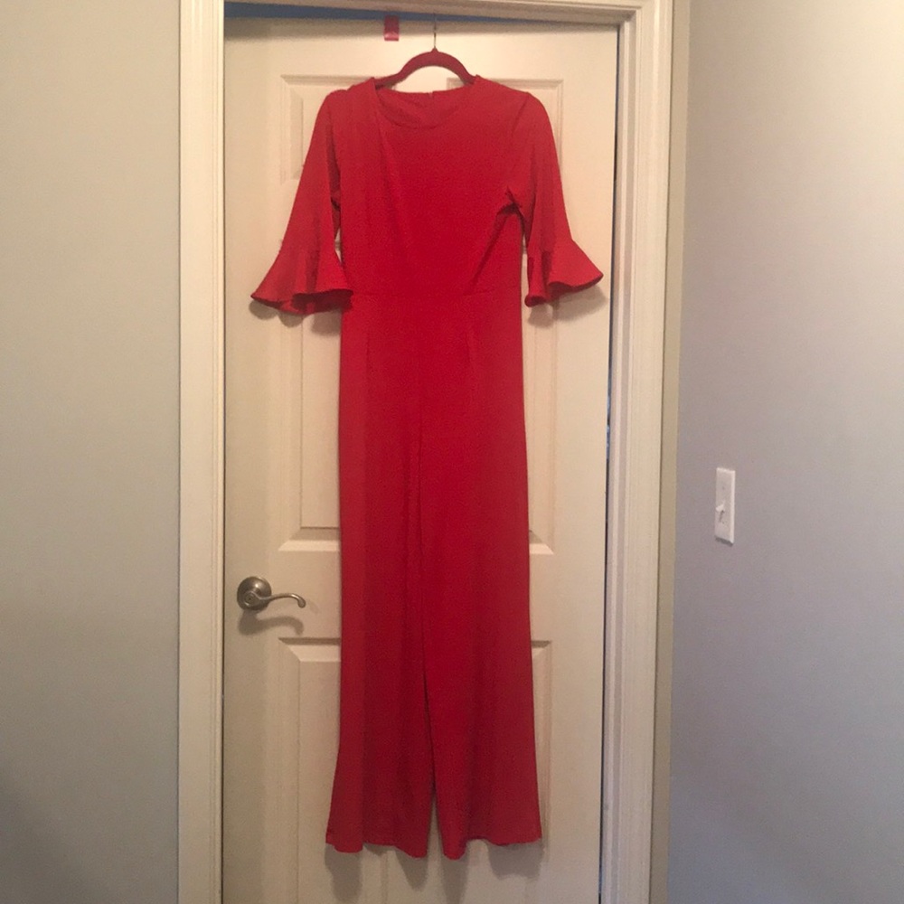 Gently used red jumpsuit with belt